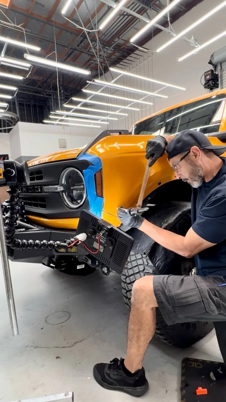 Paintless dent repair restoring a vehicle panel in Upland California