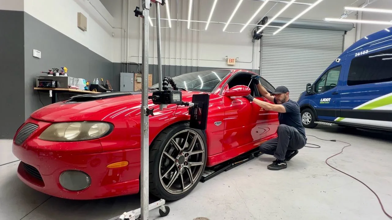 Paintless dent repair on a Pontiac GTO in Upland, California